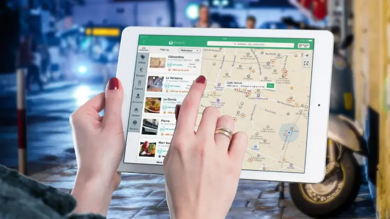 Map pins and a laptop illustrating a local SEO plan for a business on Google Maps in Indonesia