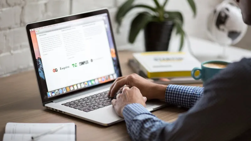 An open laptop on a desk, used to build and manage a WordPress website
