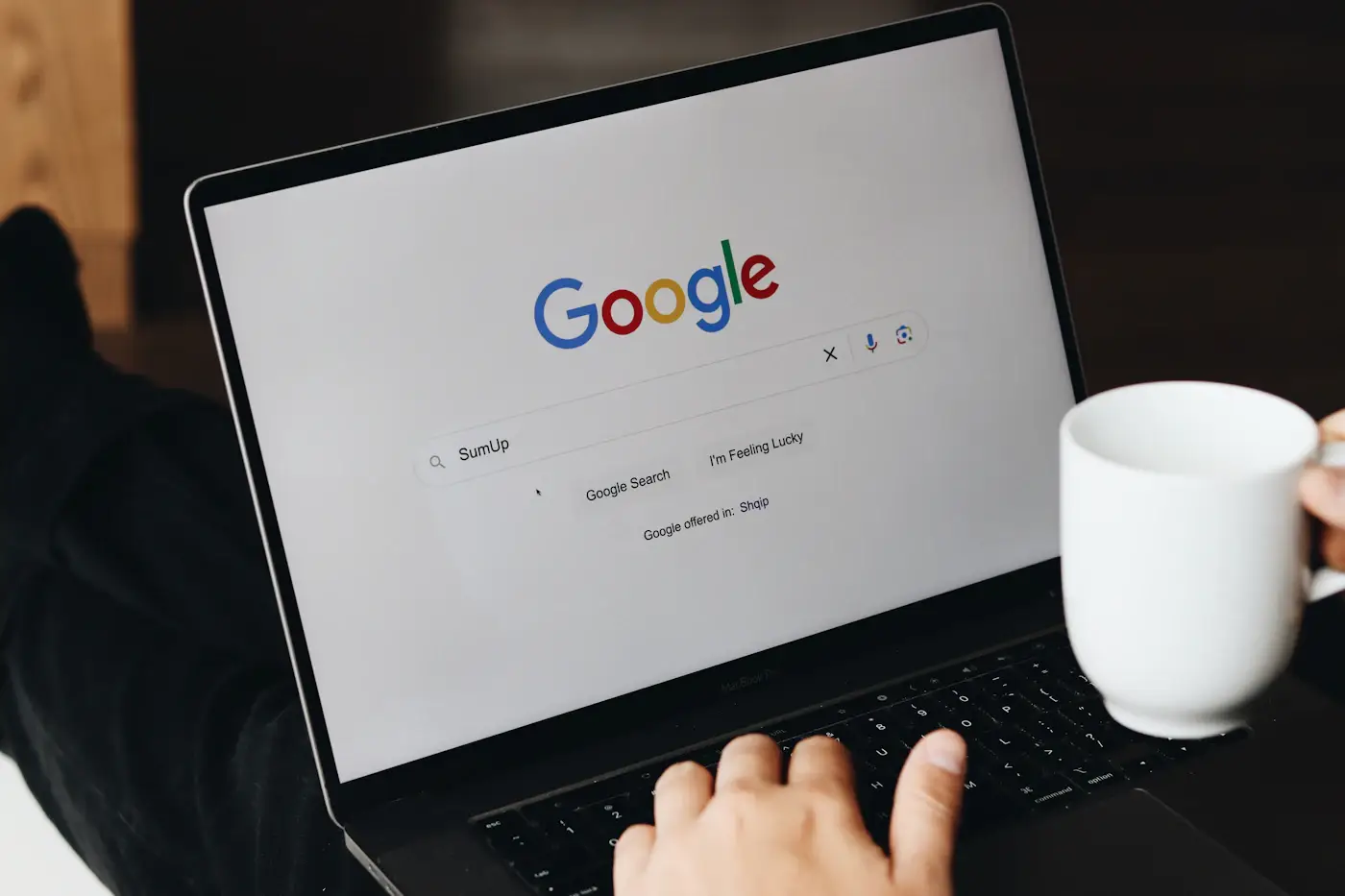 Google search results page on a laptop screen